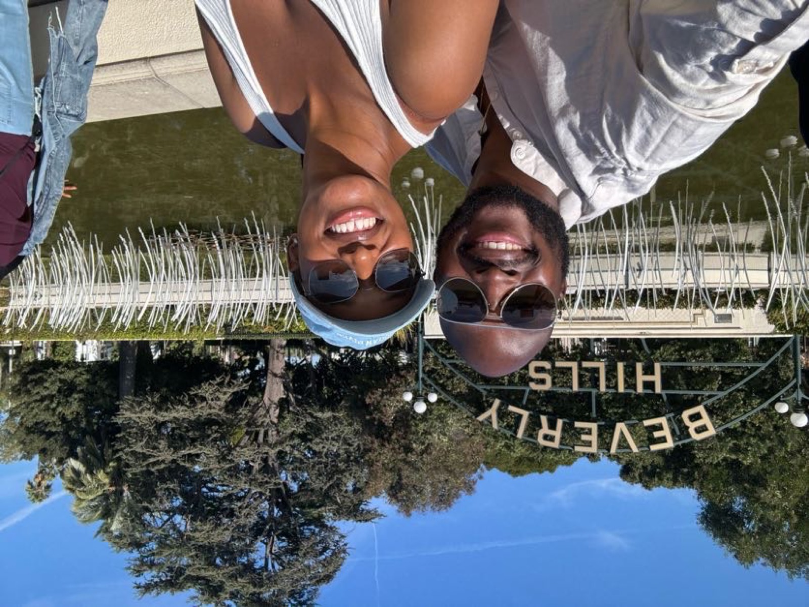 Sally and Adetunji in front of the Beverly Hills sign, November 2024