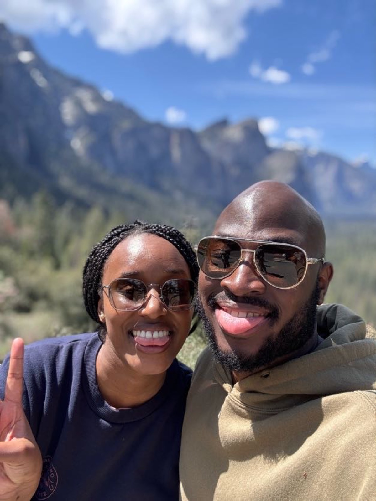 Sally and Adetunji before the granite cliffs of Yosemite, April 2025